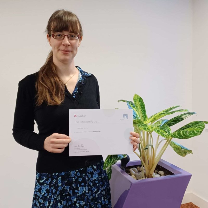 Rachel Giles with her all-issues mediator certificate from Resolution.